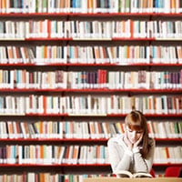 Woman wondering how many different genres of books there are